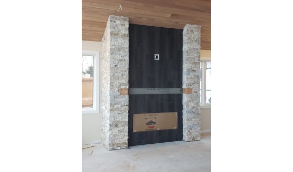 Cultured stone fireplace, North shore, tile by others